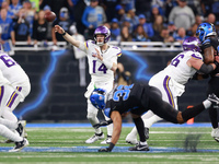 DETROIT,MICHIGAN-JANUARY 5:  Quarterback Sam Darnold (14) of the Minnesota Vikings throws the ball during a game between the Detroit Lions a...