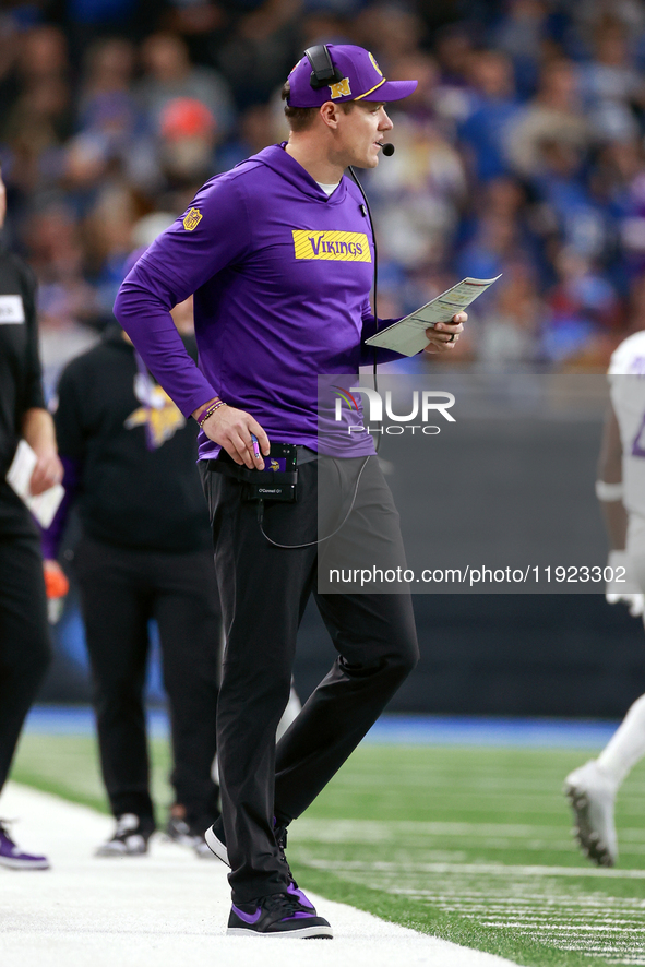 DETROIT,MICHIGAN-JANUARY 5:  Minnesota Vikings head coach Kevin O'Connell walks on the sidelines during a game between the Detroit Lions and...