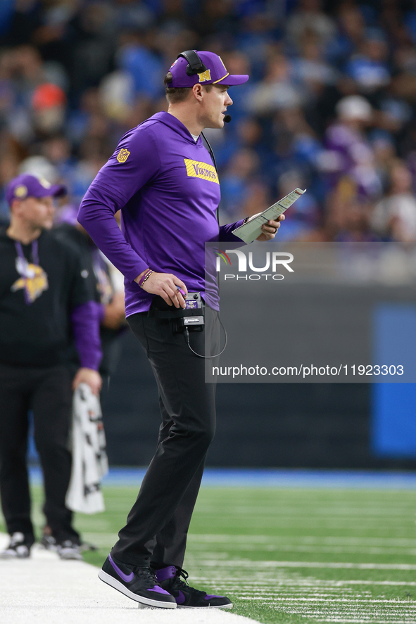 DETROIT,MICHIGAN-JANUARY 5:  Minnesota Vikings head coach Kevin O'Connell walks on the sidelines during a game between the Detroit Lions and...