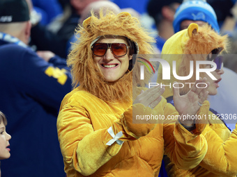 DETROIT,MICHIGAN-JANUARY 5:  A fan in a Lions costume cheers during a game between the Detroit Lions and the Minnesota Vikings in Detroit, M...