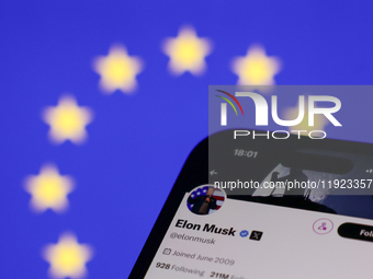 European Union flag displayed on a laptop screen and Elon Musk account on X displayed on a phone screen are seen in this illustration photo...