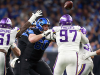 DETROIT,MICHIGAN-JANUARY 5:  Guard Graham Glasgow (60) of the Detroit Lions defends against defensive tackle Harrison Phillips (97) of the M...