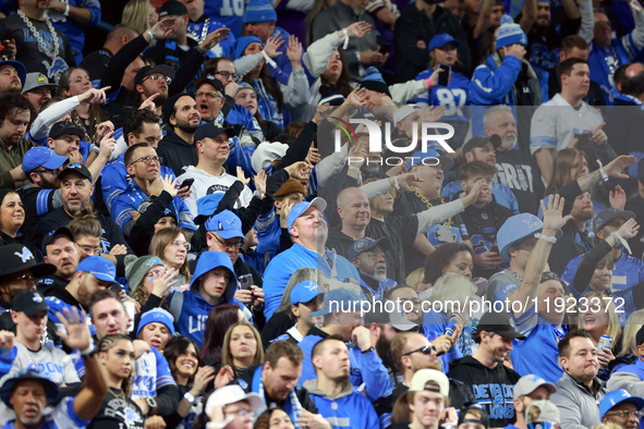 DETROIT,MICHIGAN-JANUARY 5:  Detroit Lions fans celebrate a touchdown during a game between the Detroit Lions and the Minnesota Vikings in D...