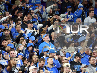 DETROIT,MICHIGAN-JANUARY 5:  Detroit Lions fans celebrate a touchdown during a game between the Detroit Lions and the Minnesota Vikings in D...