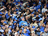 DETROIT,MICHIGAN-JANUARY 5:  Detroit Lions fans celebrate a touchdown during a game between the Detroit Lions and the Minnesota Vikings in D...