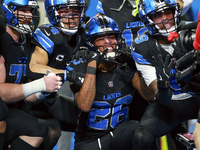 DETROIT,MICHIGAN-JANUARY 5:  Detroit Lions teammates celebrate a touchdown with running back Jahmyr Gibbs (26) of the Detroit Lions during a...