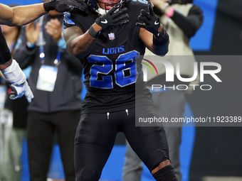 DETROIT,MICHIGAN-JANUARY 5:  Running back Jahmyr Gibbs (26) of the Detroit Lions celebrates a touchdown during a game between the Detroit Li...