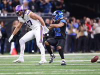 DETROIT,MICHIGAN-JANUARY 5:  Safety Brian Branch (32) of the Detroit Lions blocks tight end T.J. Hockenson (87) of the Minnesota Vikings fro...