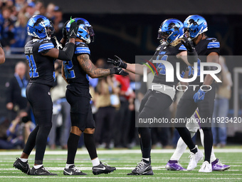 DETROIT,MICHIGAN-JANUARY 5:  Safety Kerby Joseph (31) of the Detroit Lions, safety Brian Branch (32) of the Detroit Lions and linebacker Ale...