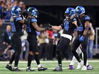 DETROIT,MICHIGAN-JANUARY 5:  Safety Kerby Joseph (31) of the Detroit Lions, safety Brian Branch (32) of the Detroit Lions and linebacker Ale...