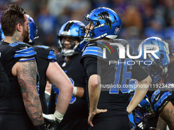 DETROIT,MICHIGAN-JANUARY 5: Quarterback Jared Goff (16) of the Detroit Lions communicates with teammates before a play during a game between...