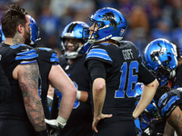 DETROIT,MICHIGAN-JANUARY 5: Quarterback Jared Goff (16) of the Detroit Lions communicates with teammates before a play during a game between...