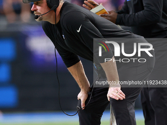 DETROIT,MICHIGAN-JANUARY 5:  Detroit Lions head coach Dan Campbell watches from the sidelines during a game between the Detroit Lions and th...