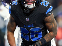 DETROIT,MICHIGAN-JANUARY 5: Running back Jahmyr Gibbs (26) of the Detroit Lions celbrates a play during a game between the Detroit Lions and...