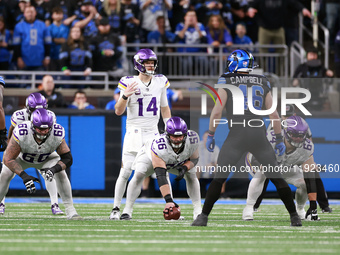 DETROIT,MICHIGAN-JANUARY 5:  Quarterback Sam Darnold (14) of the Minnesota Vikings calls a play during a game between the Detroit Lions and...