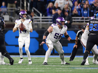 DETROIT,MICHIGAN-JANUARY 5:  Quarterback Sam Darnold (14) of the Minnesota Vikings looks to pass the ball during a game between the Detroit...