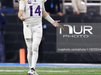 DETROIT,MICHIGAN-JANUARY 5:  Quarterback Sam Darnold (14) of the Minnesota Vikings reacts to a flag on a play during a game between the Detr...