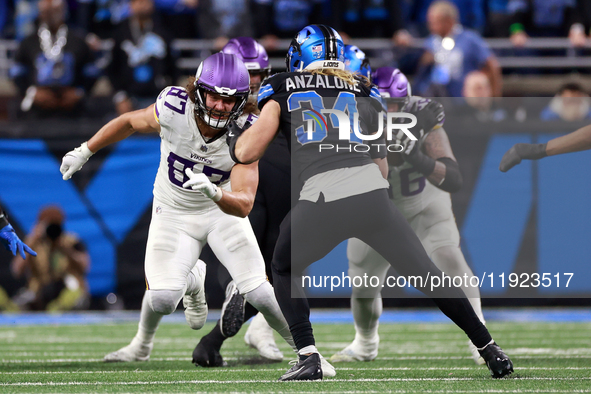 DETROIT,MICHIGAN-JANUARY 5:  Linebacker Alex Anzalone (34) of the Detroit Lions defends against tight end T.J. Hockenson (87) of the Minneso...