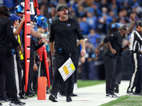 DETROIT,MICHIGAN-JANUARY 5:  Head coach Dan Campbell of the Detroit Lions walks on the sidelines during a game between the Detroit Lions and...