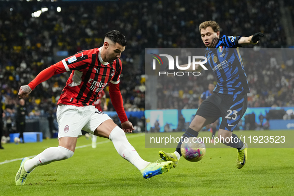 Theo Hernandez left-back of AC Milan and France and Nicolo Barella central midfield of Internazionale and Italy compete for the ball during...