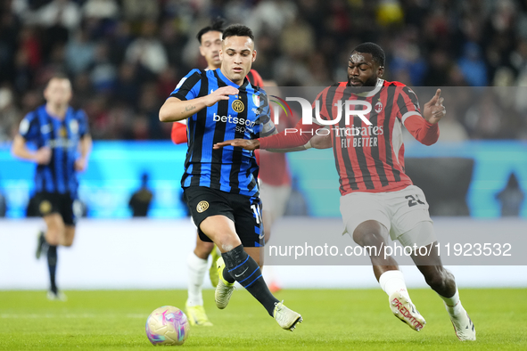 Lautaro Martinez centre-forward of Internazionale and Argentina and Youssouf Fofana defensive midfield of AC Milan and France during the EA...