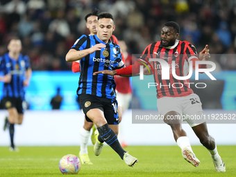 Lautaro Martinez centre-forward of Internazionale and Argentina and Youssouf Fofana defensive midfield of AC Milan and France during the EA...