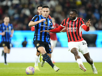 Lautaro Martinez centre-forward of Internazionale and Argentina and Youssouf Fofana defensive midfield of AC Milan and France during the EA...