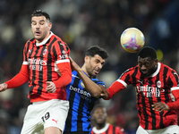 Mehdi Taremi centre-forward of Internazionale and Iran and Youssouf Fofana defensive midfield of AC Milan and France compete for the ball du...