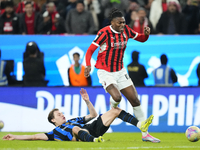 Rafael Leao left winger of AC Milan and Portugal and Nicolo Barella central midfield of Internazionale and Italy compete for the ball during...