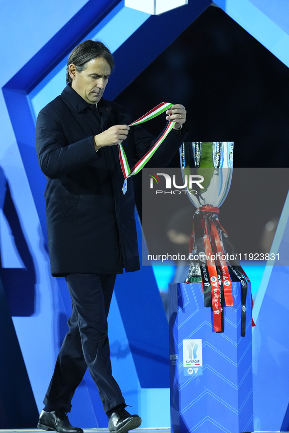 Simone Inzaghi head coach of Internazionale with the medal of runnerup after losing the EA SPORTS FC SUPERCUP 24/25 final match between FC I...