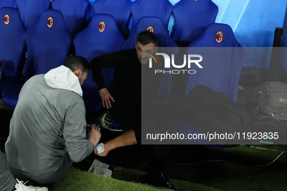 Sergio Conceiçao head coach of AC Milan heals from a celebratory injury during the EA SPORTS FC SUPERCUP 24/25 final match between FC Intern...