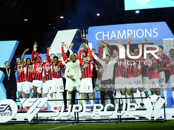 Davide Calabria right-back of AC Milan and Italy lifts the trophy after winning with his team the EA SPORTS FC SUPERCUP 24/25 final match be...