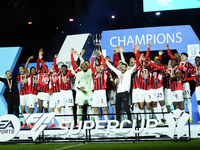 Davide Calabria right-back of AC Milan and Italy lifts the trophy after winning with his team the EA SPORTS FC SUPERCUP 24/25 final match be...