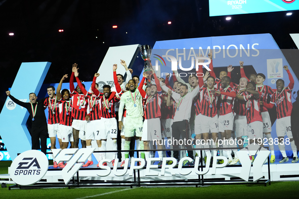 Davide Calabria right-back of AC Milan and Italy lifts the trophy after winning with his team the EA SPORTS FC SUPERCUP 24/25 final match be...