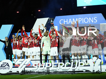 Davide Calabria right-back of AC Milan and Italy lifts the trophy after winning with his team the EA SPORTS FC SUPERCUP 24/25 final match be...