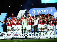 Davide Calabria right-back of AC Milan and Italy lifts the trophy after winning with his team the EA SPORTS FC SUPERCUP 24/25 final match be...