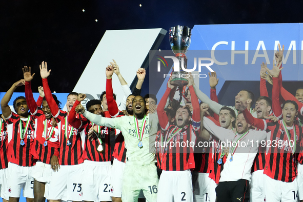 Davide Calabria right-back of AC Milan and Italy lifts the trophy after winning with his team the EA SPORTS FC SUPERCUP 24/25 final match be...