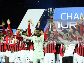 Davide Calabria right-back of AC Milan and Italy lifts the trophy after winning with his team the EA SPORTS FC SUPERCUP 24/25 final match be...