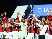 Davide Calabria right-back of AC Milan and Italy lifts the trophy after winning with his team the EA SPORTS FC SUPERCUP 24/25 final match be...