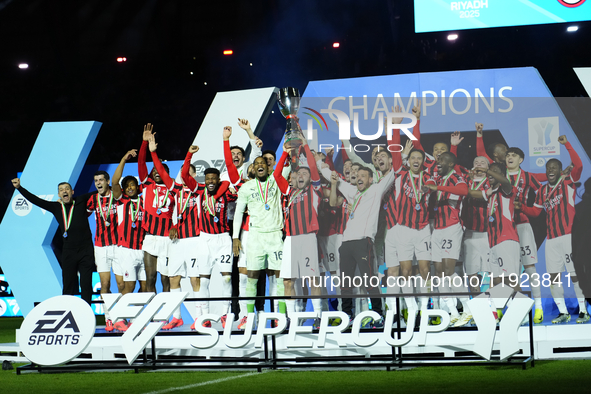 Davide Calabria right-back of AC Milan and Italy lifts the trophy after winning with his team the EA SPORTS FC SUPERCUP 24/25 final match be...