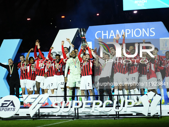 Davide Calabria right-back of AC Milan and Italy lifts the trophy after winning with his team the EA SPORTS FC SUPERCUP 24/25 final match be...