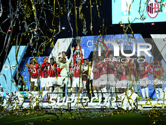 Davide Calabria right-back of AC Milan and Italy lifts the trophy after winning with his team the EA SPORTS FC SUPERCUP 24/25 final match be...