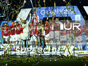 Davide Calabria right-back of AC Milan and Italy lifts the trophy after winning with his team the EA SPORTS FC SUPERCUP 24/25 final match be...