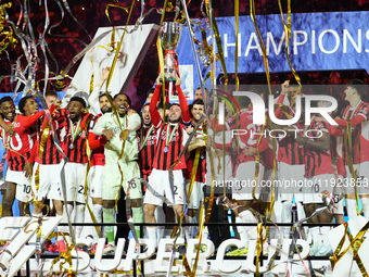 Davide Calabria right-back of AC Milan and Italy lifts the trophy after winning with his team the EA SPORTS FC SUPERCUP 24/25 final match be...