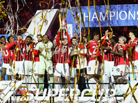 Davide Calabria right-back of AC Milan and Italy lifts the trophy after winning with his team the EA SPORTS FC SUPERCUP 24/25 final match be...