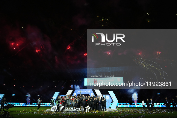 Davide Calabria right-back of AC Milan and Italy lifts the trophy after winning with his team the EA SPORTS FC SUPERCUP 24/25 final match be...