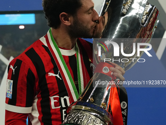 Davide Calabria right-back of AC Milan and Italy celebrates with the trophy after winning the EA SPORTS FC SUPERCUP 24/25 final match betwee...