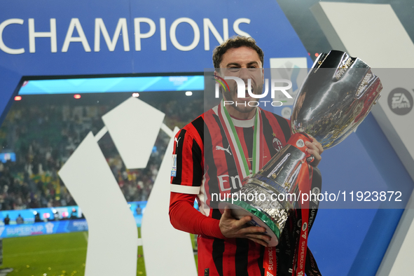 Davide Calabria right-back of AC Milan and Italy celebrates with the trophy after winning the EA SPORTS FC SUPERCUP 24/25 final match betwee...