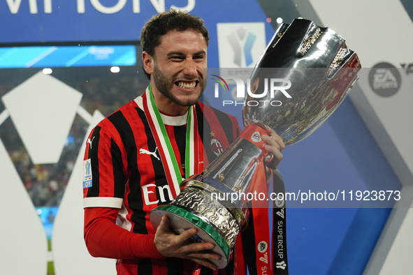 Davide Calabria right-back of AC Milan and Italy celebrates with the trophy after winning the EA SPORTS FC SUPERCUP 24/25 final match betwee...