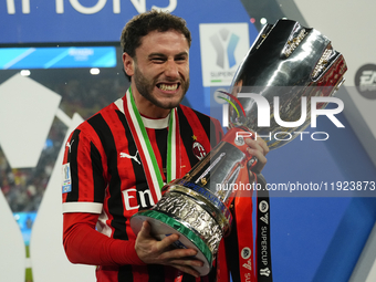 Davide Calabria right-back of AC Milan and Italy celebrates with the trophy after winning the EA SPORTS FC SUPERCUP 24/25 final match betwee...